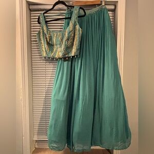 Elegant Teal Lehenga with Gold Accents